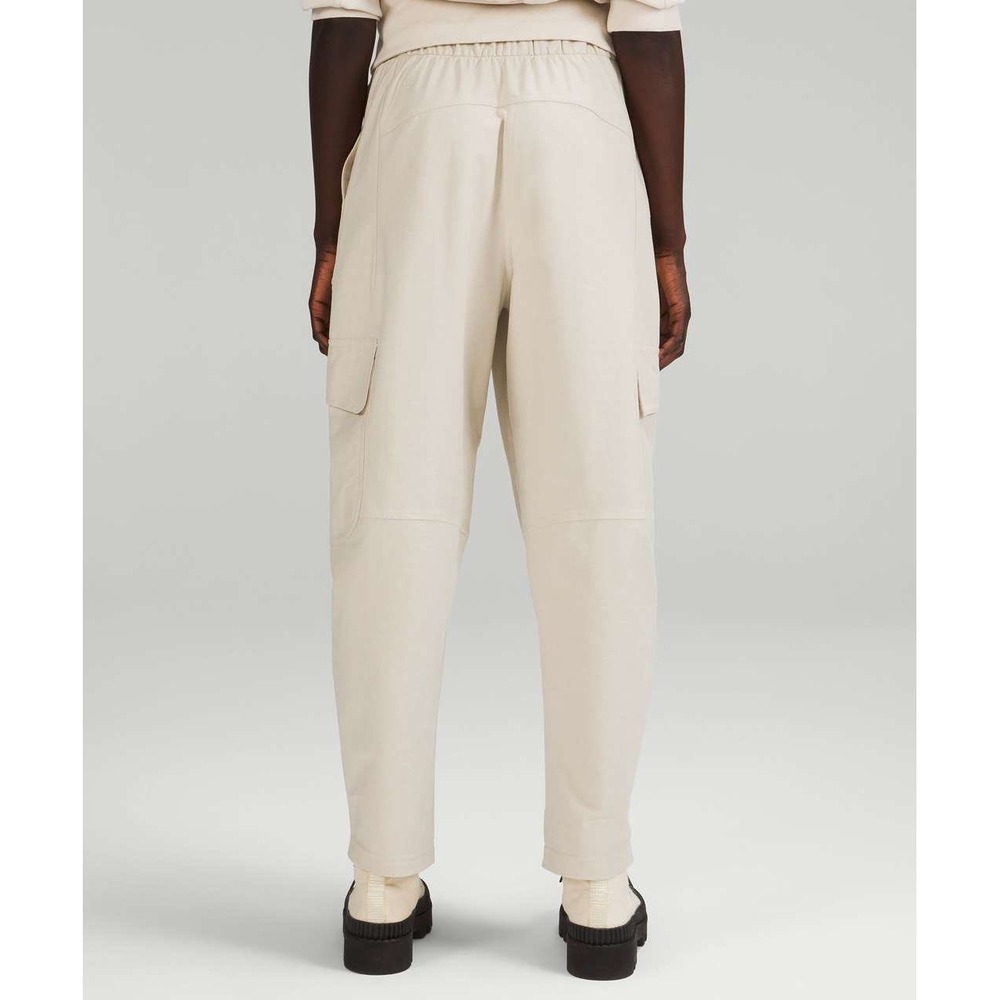 Lululemon Light Utilitech Cargo Pocket High-Rise Pant
Natural Ivory Size 25 NEW